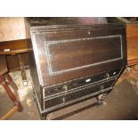 Early 20th Century oak bureau with fall front above two drawers on barley twist supports