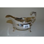 George II silver sauce boat raised on three hoof feet, London,