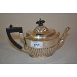 London silver oval bachelor's teapot with ebonised handle and half gadroon decoration