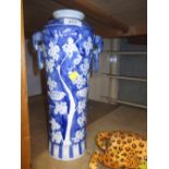 Chinese blue and white bird and prunus blossom decorated two handled vase with mark to base