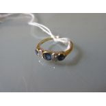 18ct Gold seven stone sapphire and diamond ring