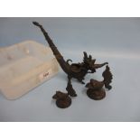 Far Eastern bronze pipe in the form of a dragon together with two weights in the form of fish