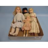 Group of four various late 19th / early 20th Century bisque headed and wax headed dolls (a/f)