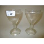 Pair of Lalique goblets with vine decorated stems