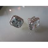 Pair of 18ct white gold aquamarine and diamond stud earrings, the aquamarines approximately 2.