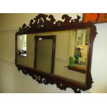 18th Century mahogany rectangular fretwork mirror having carved and gilded applied decoration with