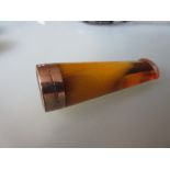 9ct Gold mounted amber cigar holder retailed by Army and Navy,