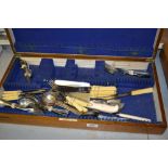 Oak canteen box containing a quantity of various loose silver plated cutlery