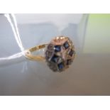 18ct Yellow gold circular sapphire and diamond set cluster ring