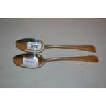 Pair of George III silver Old English pattern feather edge spoons