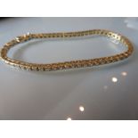 18ct Yellow gold diamond set line bracelet