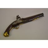 18th Century flintlock pistol with steel ramrod and brass mounts,