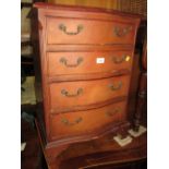 Small reproduction mahogany four drawer bedside chest together with a circular mahogany and line