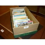 Box with various postcards