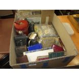 Box containing a quantity of miscellaneous items including: hip flasks, two cameras, playing cards,