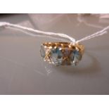 18ct Yellow gold aquamarine and diamond set half hoop ring