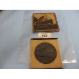 Early 20th Century cast iron Commemorative replica medal of The Lusitania in original box