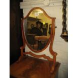 Reproduction mahogany shield shaped swing frame toilet mirror together with two occasional tables