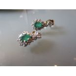 Pair of 18ct gold diamond and emerald set drop earrings