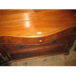 Victorian mahogany serpentine fronted three drawer chest (a/f)