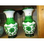 Pair of 20th Century Chinese Peking green overlaid white glass baluster form vases decorated with