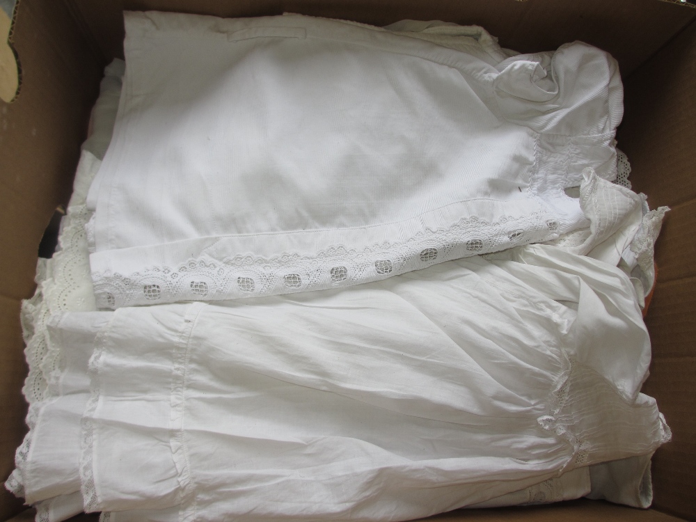 Box containing a quantity of childrens antique white work and Christening gowns etc