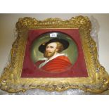 Pair of late 19th Century continental porcelain circular plaques painted with portraits,