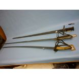 19th Century sabre with brass hilt together with a similar sabre with steel hilt and another sword