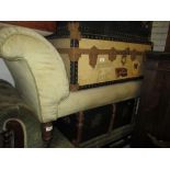 Late 19th Century button upholstered chaise longue on turned tapering supports with brass and