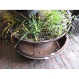 Three various cast iron circular garden planters