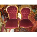 Pair of Victorian walnut and button upholstered ladies and gentlemens drawing room chairs,