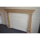 Large 19th Century pine fire surround with carved moulded mantel and reeded column supports