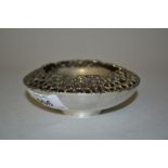 Stuart Devlin, London silver circular dish having stylised rim with gilded interior,