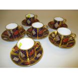 Set of six Caverswall Imari pattern coffee cans with saucers