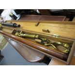 19th Century Ross of London leather covered telescope with gilt brass and wooden tripods,