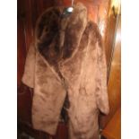 Ladies three quarter length brown fur jacket together with two fur stoles and a fur hat