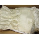 Box containing a quantity of various table linen including a small Christening gown