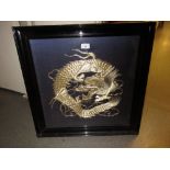 Chinese gold thread work dragon picture housed in an ebonised frame