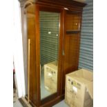 Edwardian mahogany and satinwood crossbanded two door wardrobe