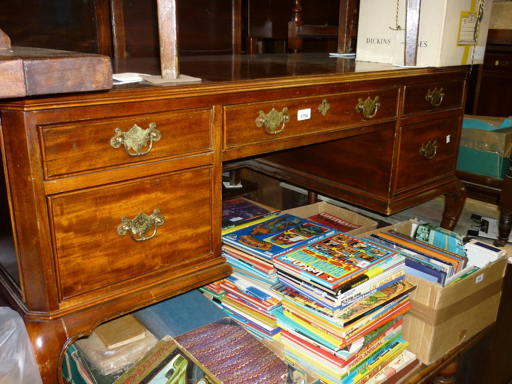 Reproduction cherry wood five drawer kneehole desk on cabriole supports (leg damage) and a similar