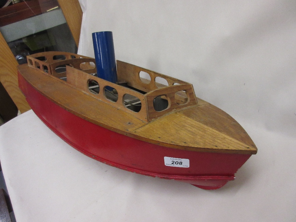 Bassett Lowke live steam model boat (lacking covers), with red painted metal hull,