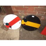 Two circular vitreous enamel iron mounted signals with Perspex cut outs in red and white and black