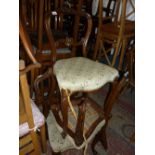 Set of three Victorian rosewood shaped balloon back side chairs and a Regency mahogany side chair