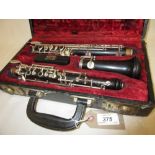 Cased oboe by Boosey and Hawkes,