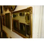 Rectangular gilt framed wall mirror with bevel edged plate and two other slim gilt framed hall