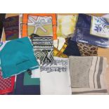 Quantity of various ladies designer silk scarves including: Gucci, Hermes,