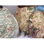 Two bags containing a pair of floral design Morris curtains,