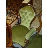 Victorian green button upholstered low seat nursing chair on cabriole front supports