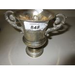 London silver floral decorated two handled trophy cup,