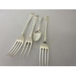 George II London silver three prong fork together with a pair of George III silver table forks and